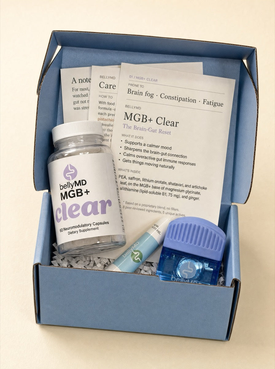 Inside the MGB+ Clear Welcome Kit: the bottle, printed Protocol Cards, and BellyMD extras